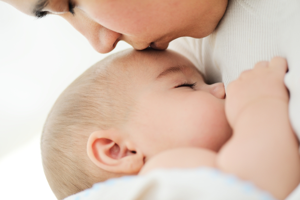 Baby having moms care
